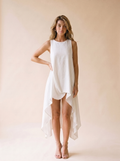 Cassis — High-Low Round Neck Sleeveless Dress, front view, hand on hip