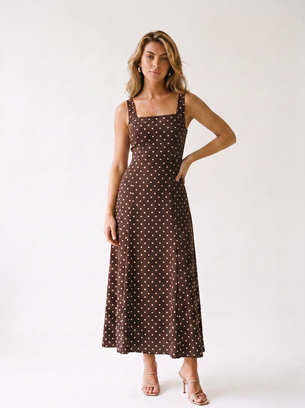 Cefalu — Polka Dot Sleeveless Maxi Dress, front view, hand on hip
