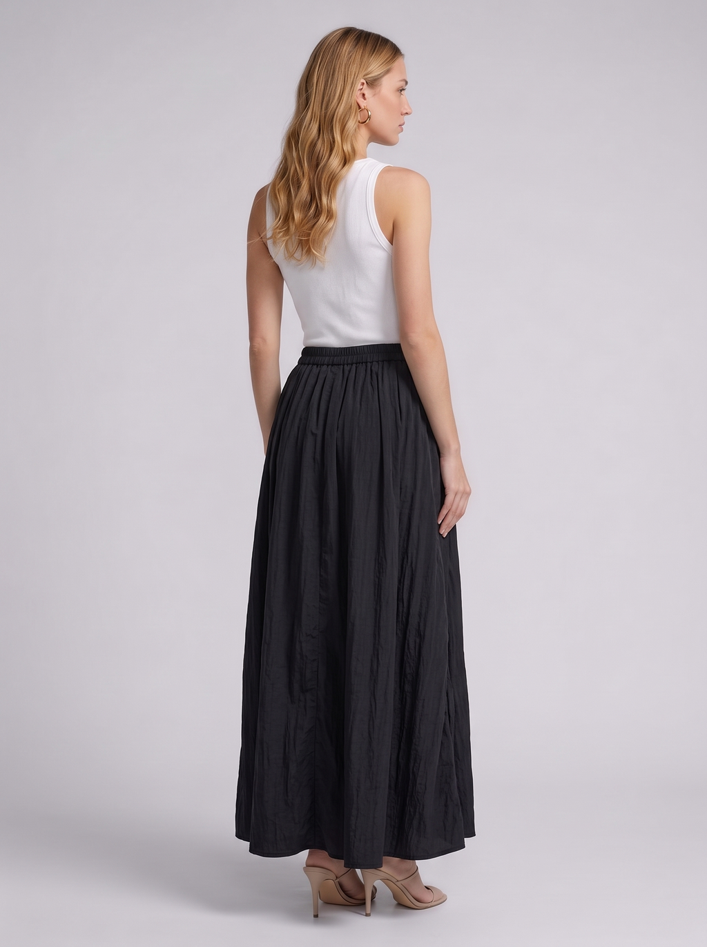 Levanto Pleated Maxi Skirt, back view on model
