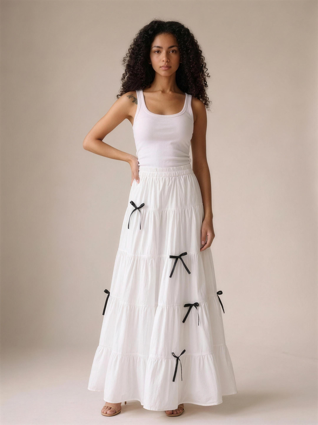 Panarea — Tiered Bow Maxi Skirt, front view, hand on hip