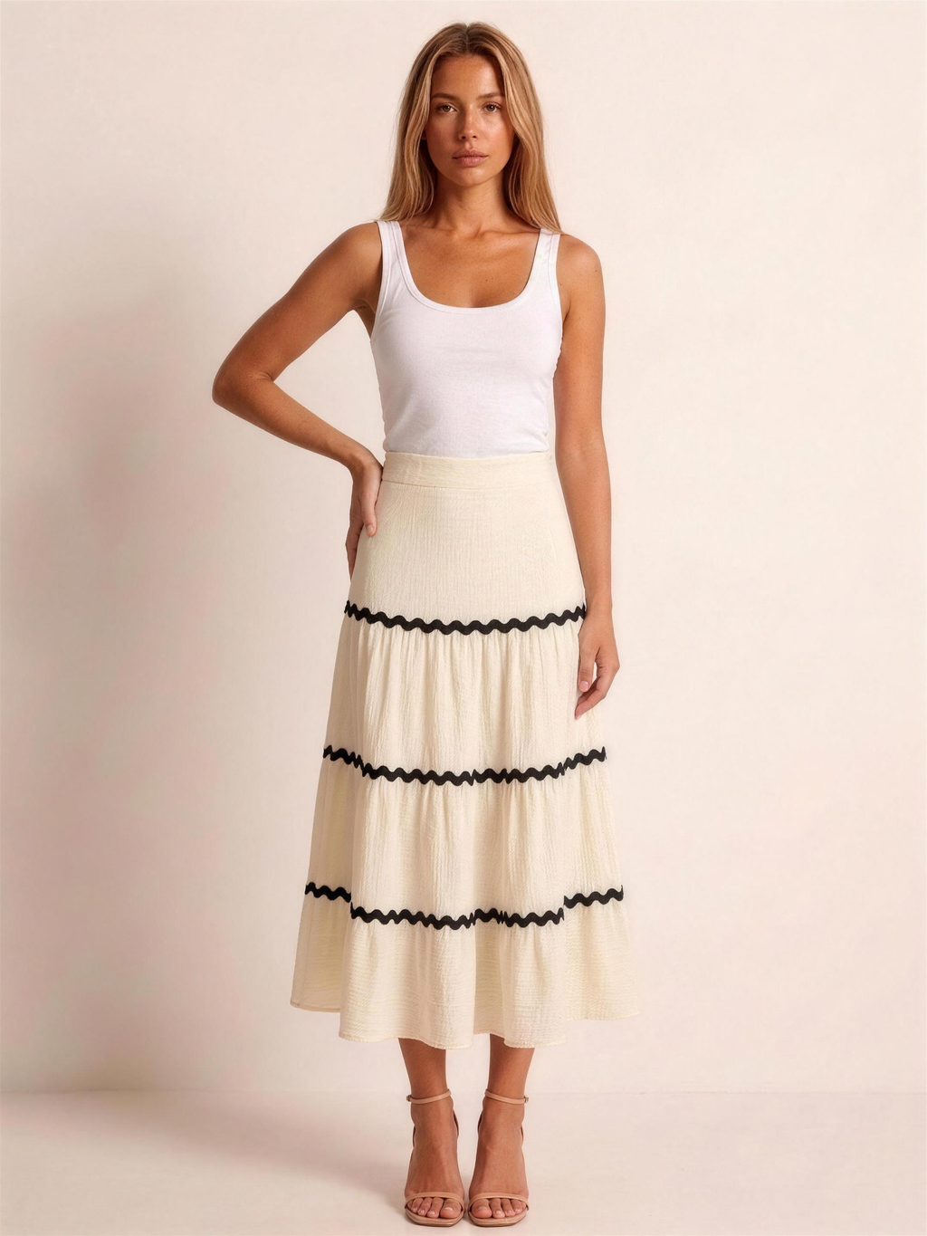 Maiori — Tiered Flowy Midi Skirt, front view, hand on hip